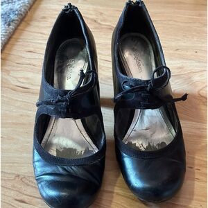 Black leather Mary Janes